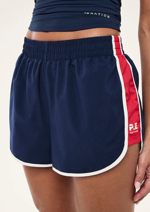 pe nation Preset Short Dark Navy Strawberry accent front left angle