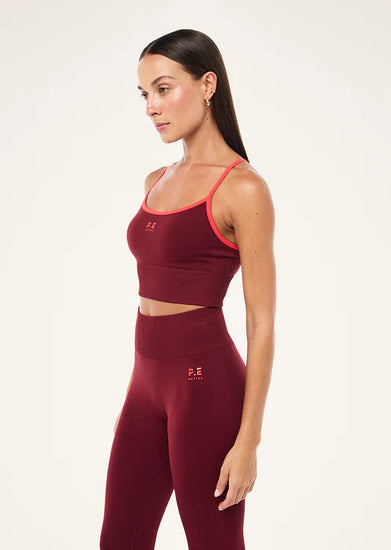 Release Seamless Tank top racerback Cabernet Strawberry left angle on model